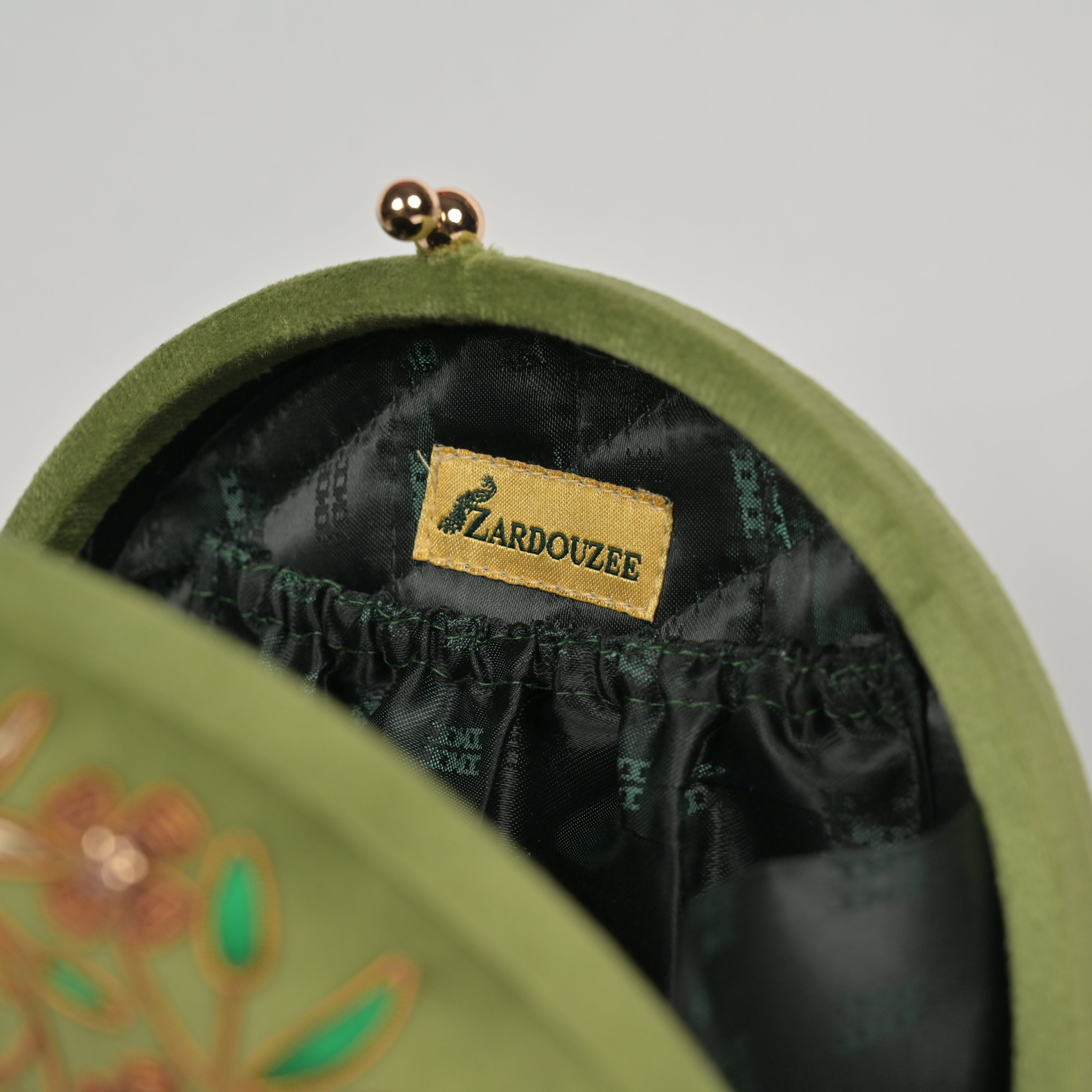 Regal Bloom Round Clutch – Onyx Black Velvet