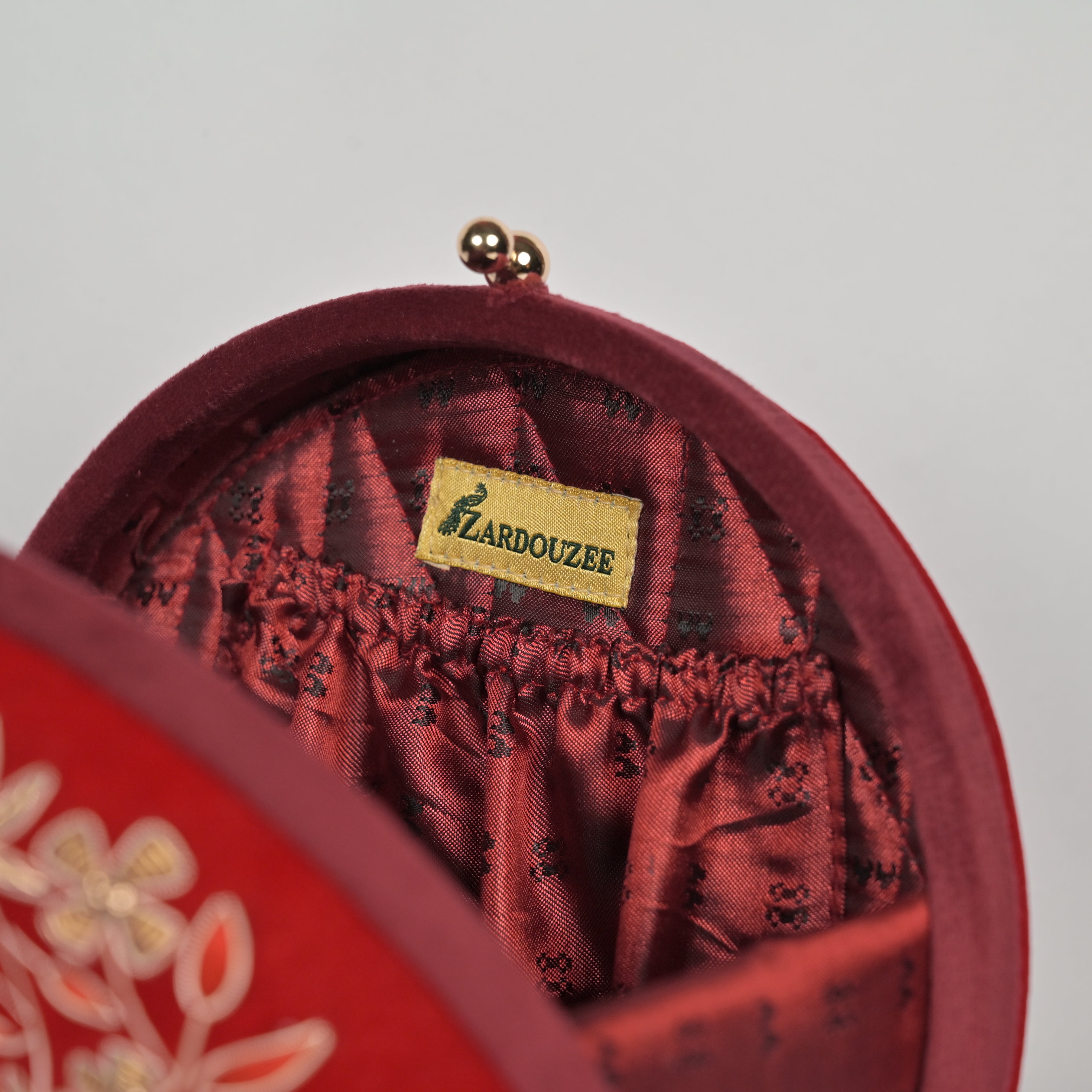 Regal Bloom Round Clutch – Onyx Black Velvet